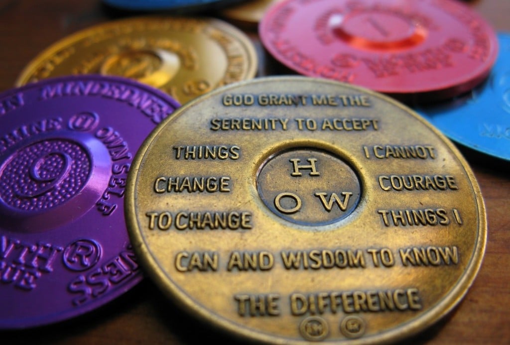LSD therapy can support the fundamental goals of AA, embodied in the Serenity Prayer depicted on their sobriety medallions | Image Source: frankieleon via Wikimedia Commons
